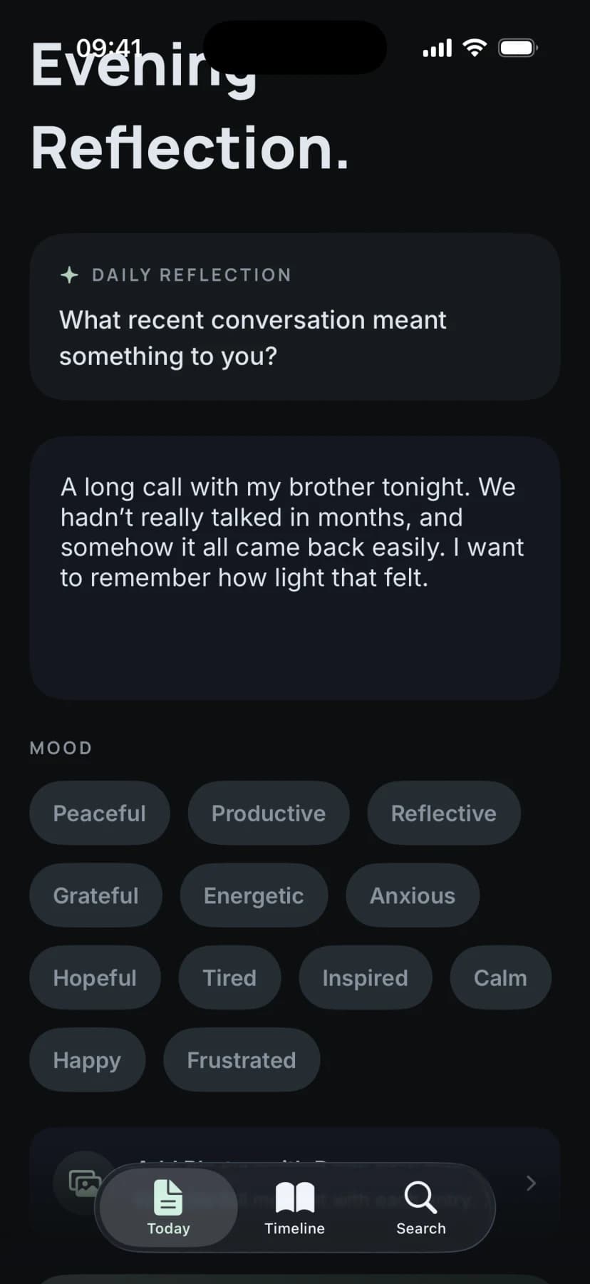 Gloam daily reflection screen with a written entry and mood chips
